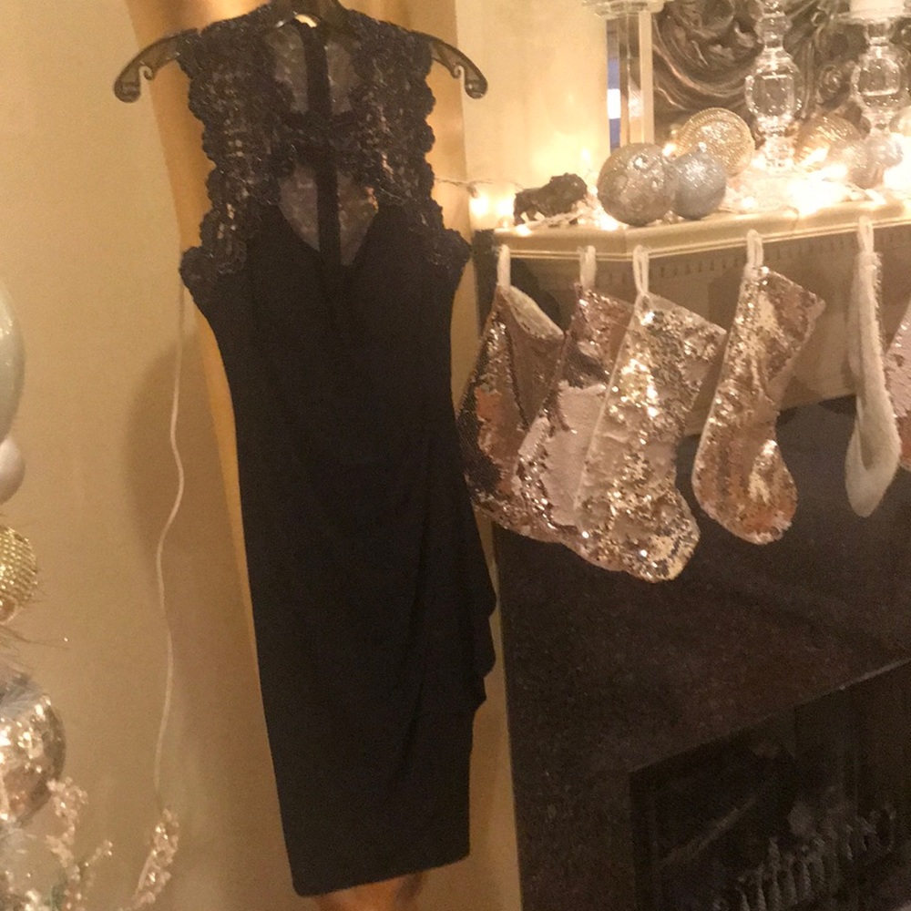 Cach’e small black dress with cut out and lace